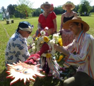 Decorating the Maypole at Beltane